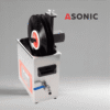 ASONIC приставка за почистване на винил за до пет плочи, показана върху ултразвуков почистващ апарат.